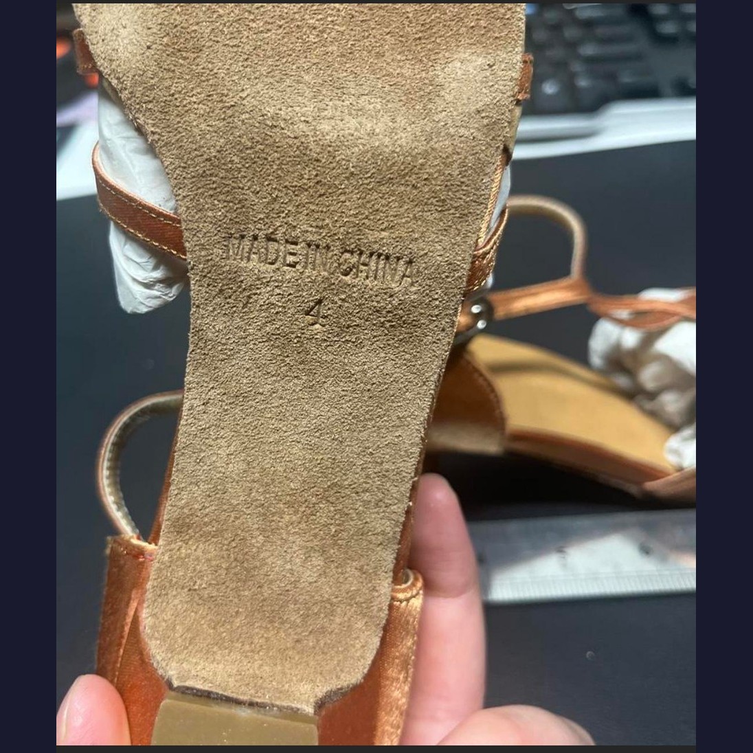 Bronze dance shoes, size 4, sole closeup showing size stamp