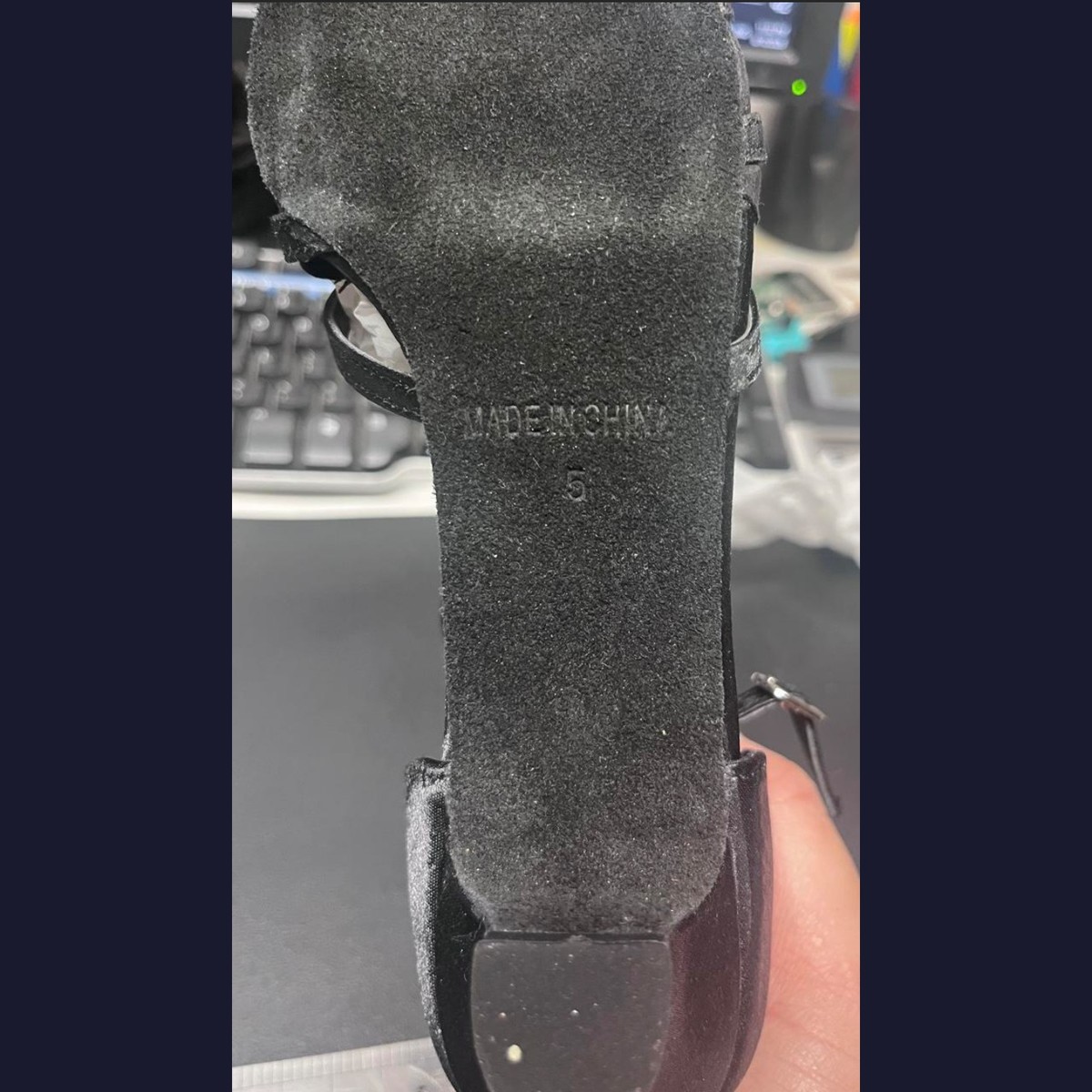 Black dance shoes, size 5, sole closeup showing size stamp